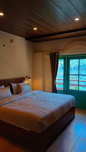 Lake view room with teal window frames